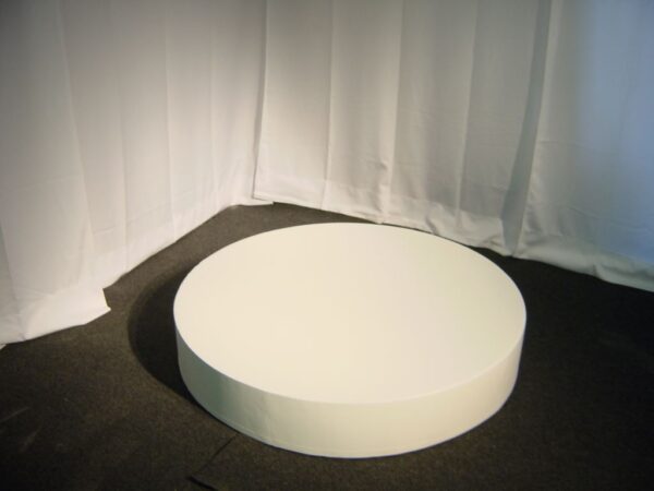 This is full round staging riser painted white.