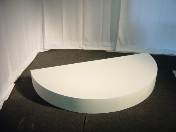 This is half round staging riser painted white.